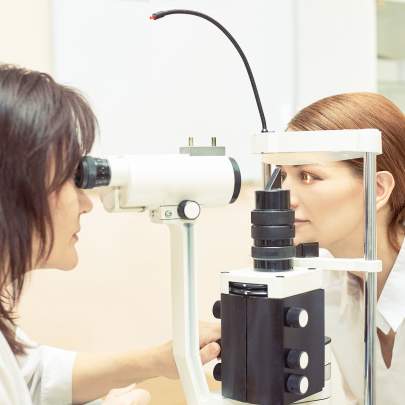 Optometrist giving an eye exam