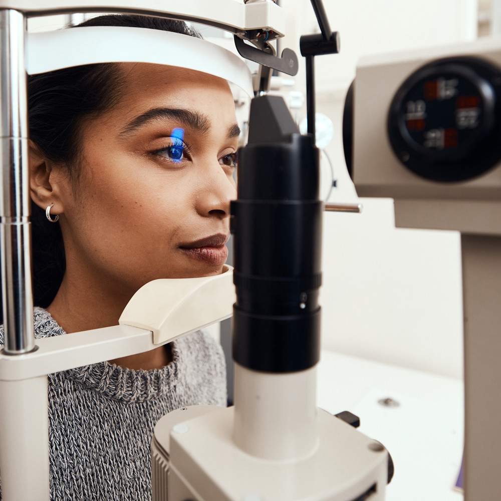 young woman having an eye examination