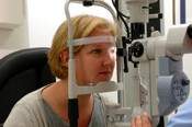 woman receiving an eye exam